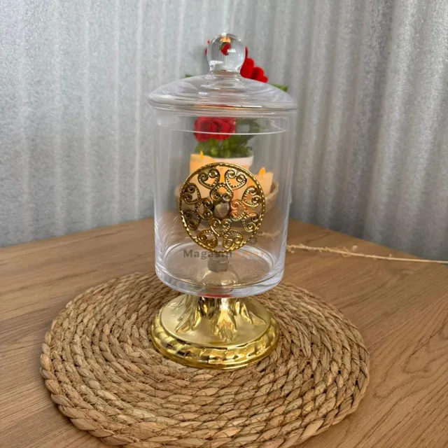 Bonbonnière en verre avec pied doré